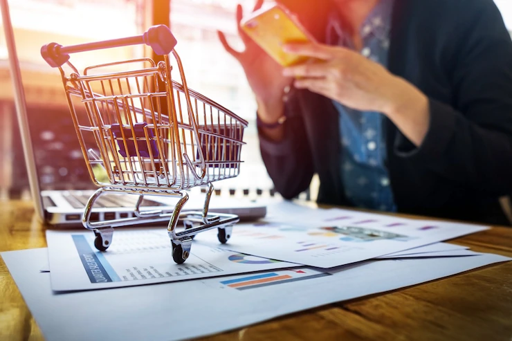 cropped image woman inputting card information key phone laptop while shopping online 1423 68